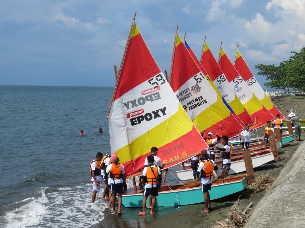 Oz Goose Sailboats being launched at the end of community boat building event in Butuan Philippines