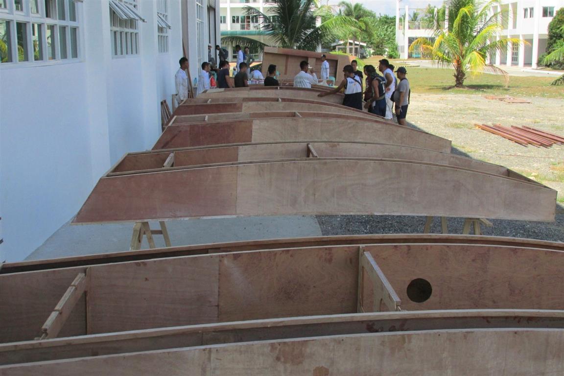 Students in Butuan Philippines build 20 sailboats to the Oz goose design for their sailing programme